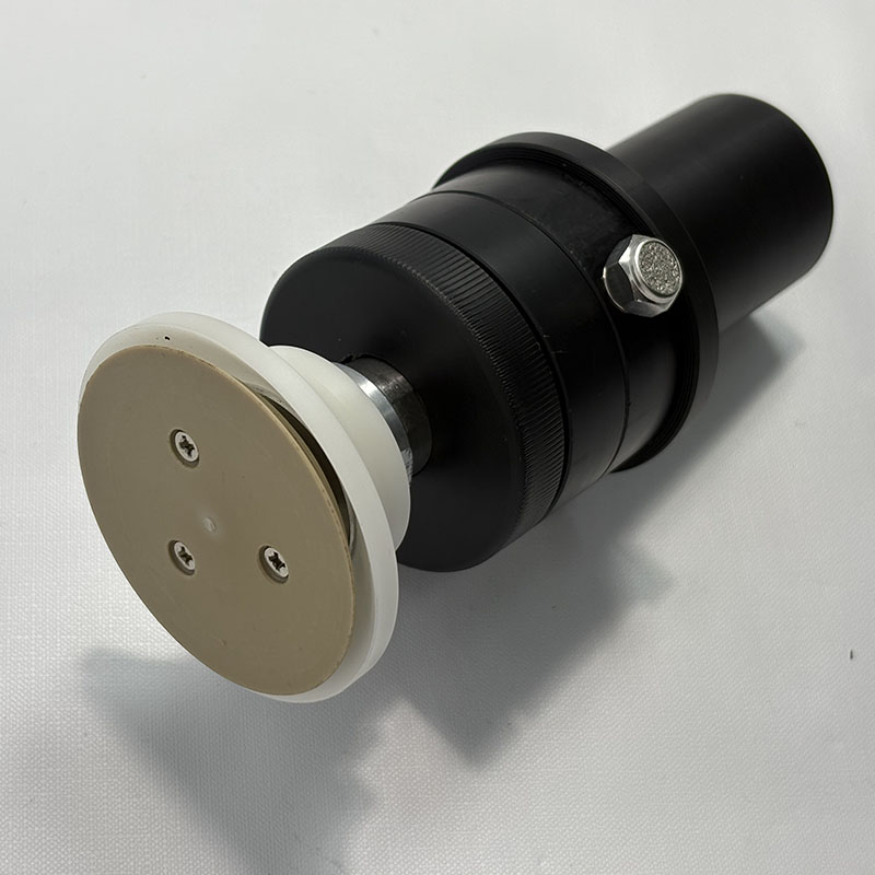 Hand held rotary spray gun